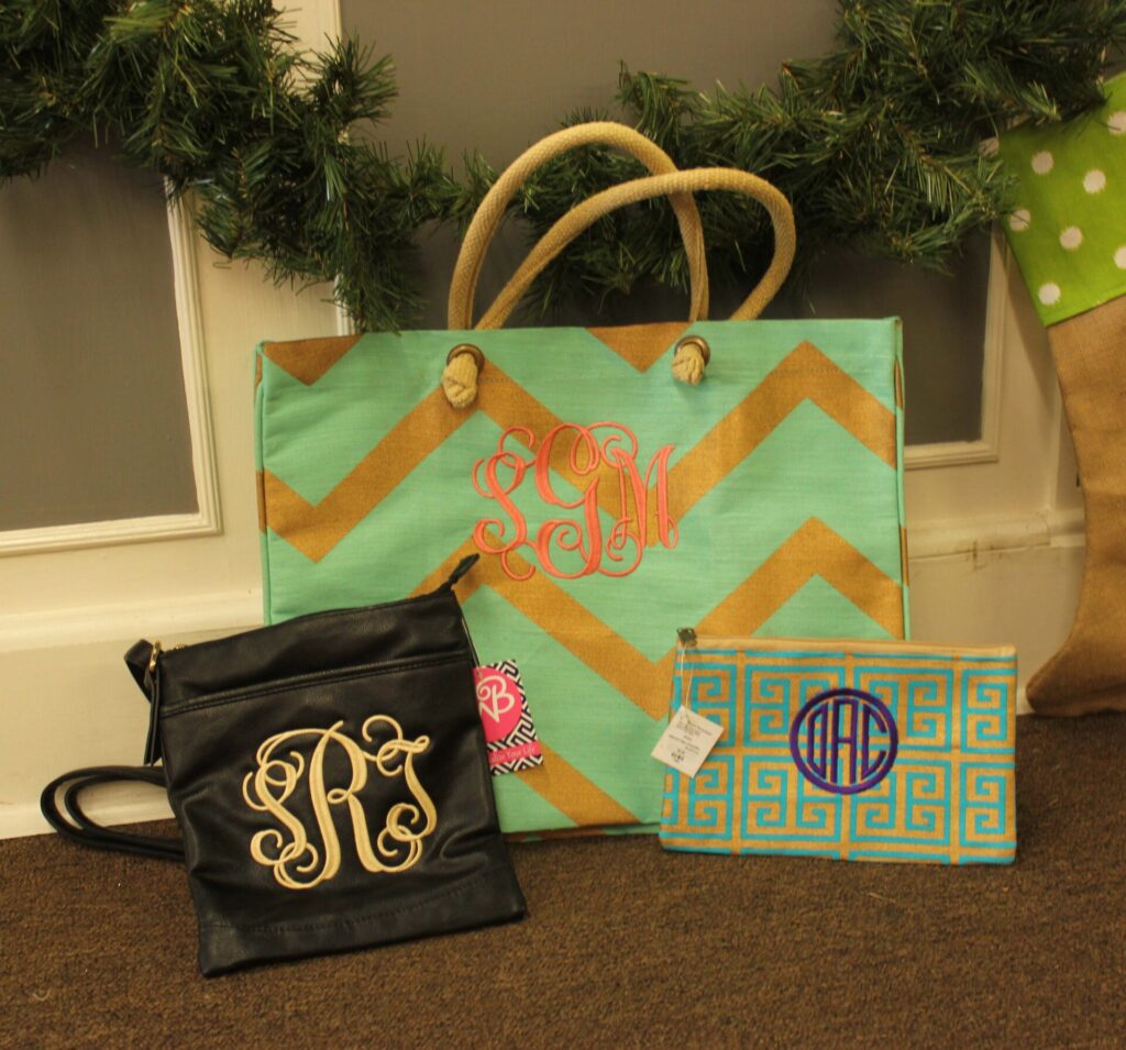 (from left) Crossbody purse $30, Chevron Juco Tote $27.95, and Cosmetic bag $9.95