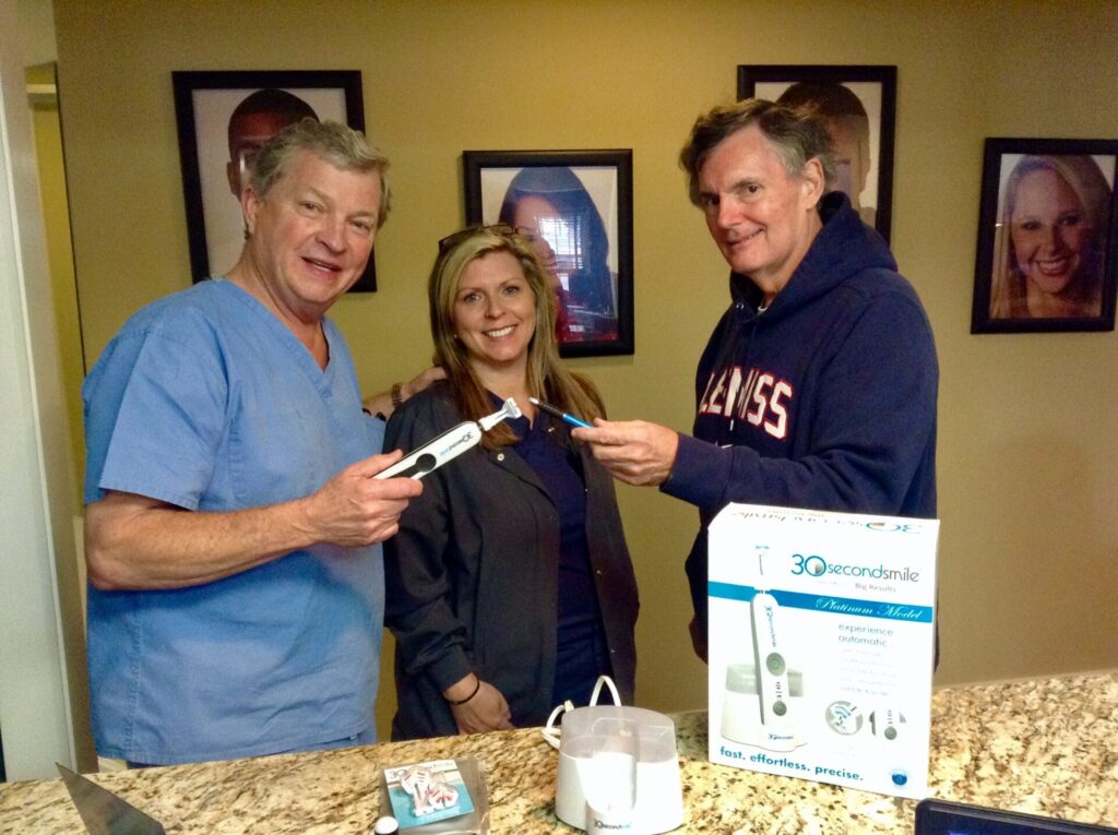 Dentists and Ole Miss alums Dr. Walker Swaney, and Dr. Michael Person along with Lorea Perkins, registered dental hygienist, with '30 Second Smile'