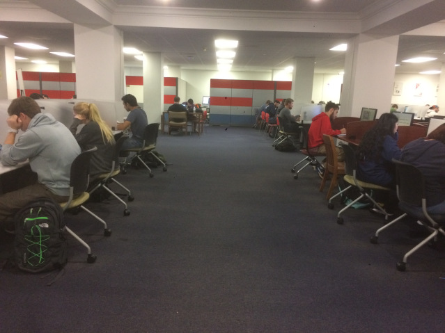 Students study in the information commons on the first floor of the library. Photo by Jack Hall.