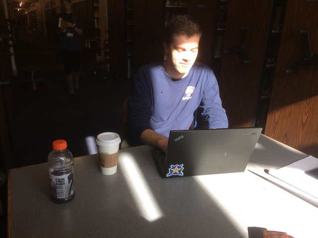 Brennan Trask studies for his upcoming final exams on the second floor of the J.D. Williams Library. Photo by Jack Hall.