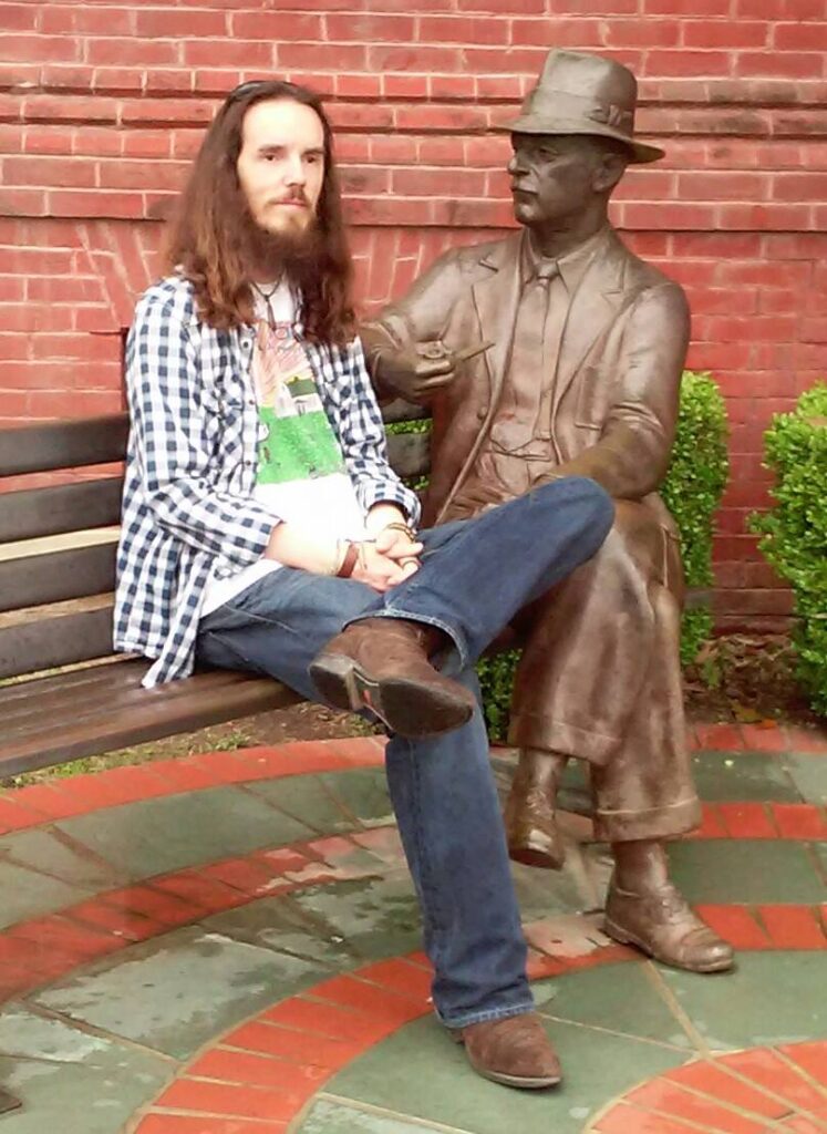 J-MAN visits with Mr. Faulkner on the Square.