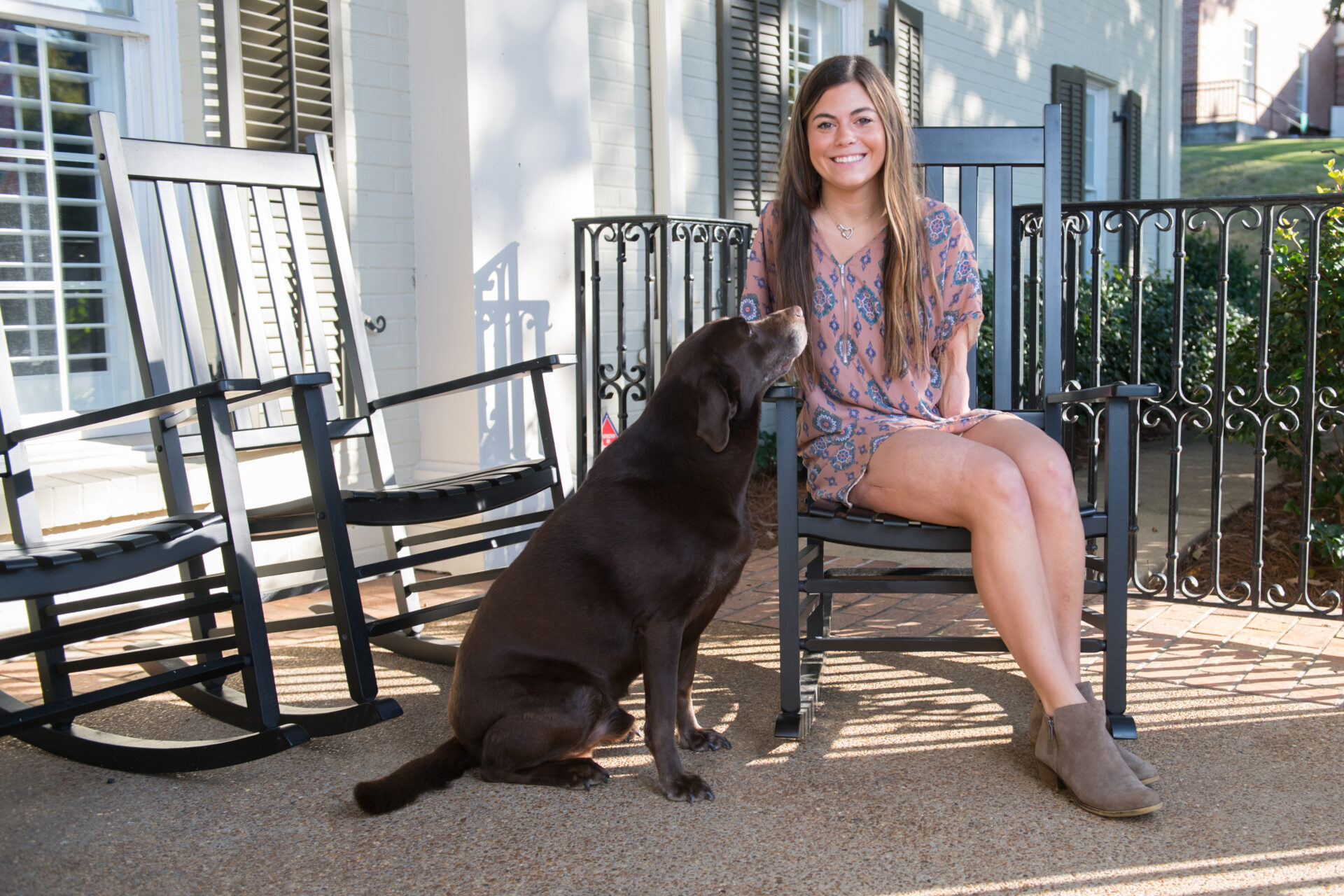 Madysen Acey, Aided by a Service Dog and a Famous Surfer's Camp, Perseveres  after Double Amputation 