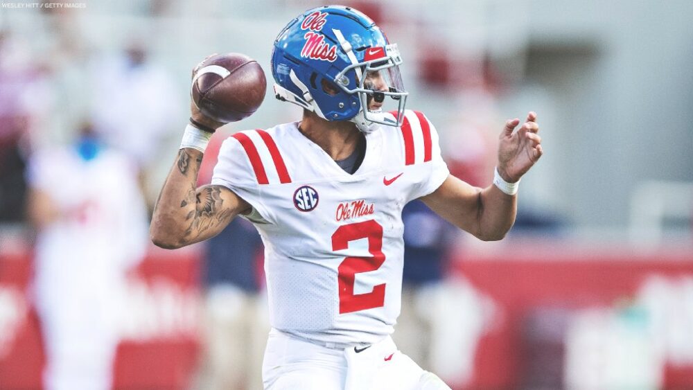 Matt Corral throwing football