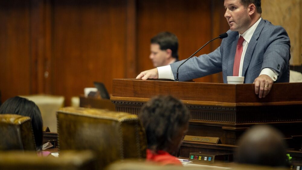 Legislator at podium