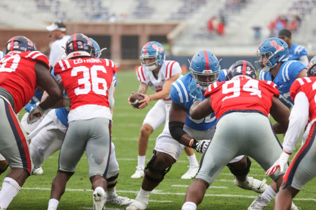 Matt Corral dropping back to pass 