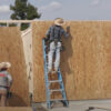 Men building a home