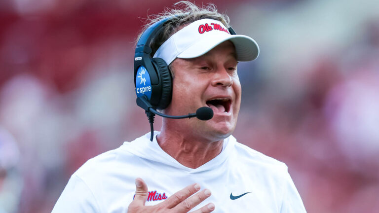 With a clear path to the playoff, Ole Miss coach Lane Kiffin talks to reporters