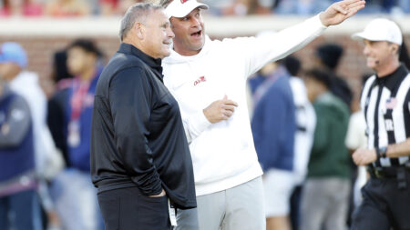 Arkansas coach Sam Pittman and Ole Miss coach Lane Kiffin