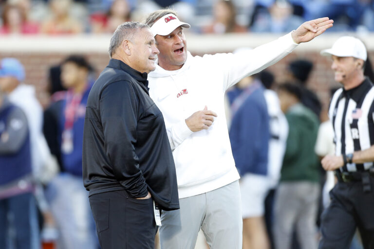 Arkansas coach Sam Pittman and Ole Miss coach Lane Kiffin