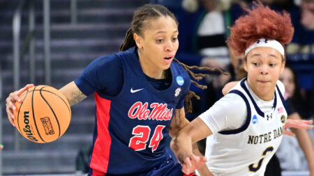 Ole Miss Rebels forward Madison Scott dribbles as Notre Dame Fighting Irish guard Hannah Hidalgo defends