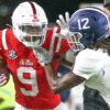 Rebels wide receiver Tre Harris (9) runs after a catch as Georgia Southern Eagles defensive back Tracy Hill Jr. (12) pushes him out of bounds