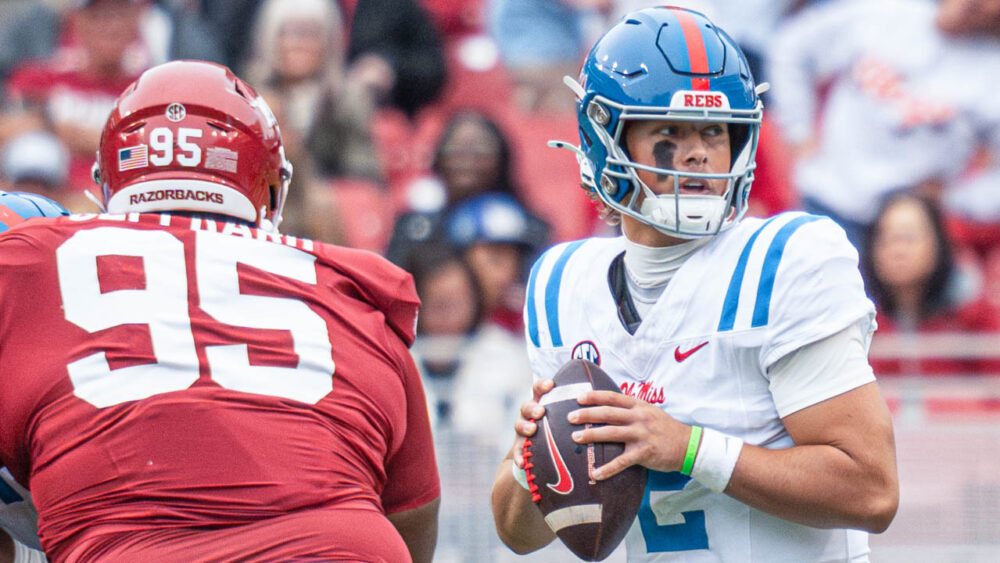 Ole Miss quarterback Jaxson Dart throws a pass against the Arkansas