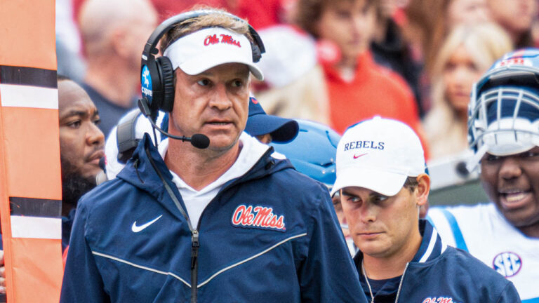 Rebels coach Lane Kiffin on the sidelines against Arkansas