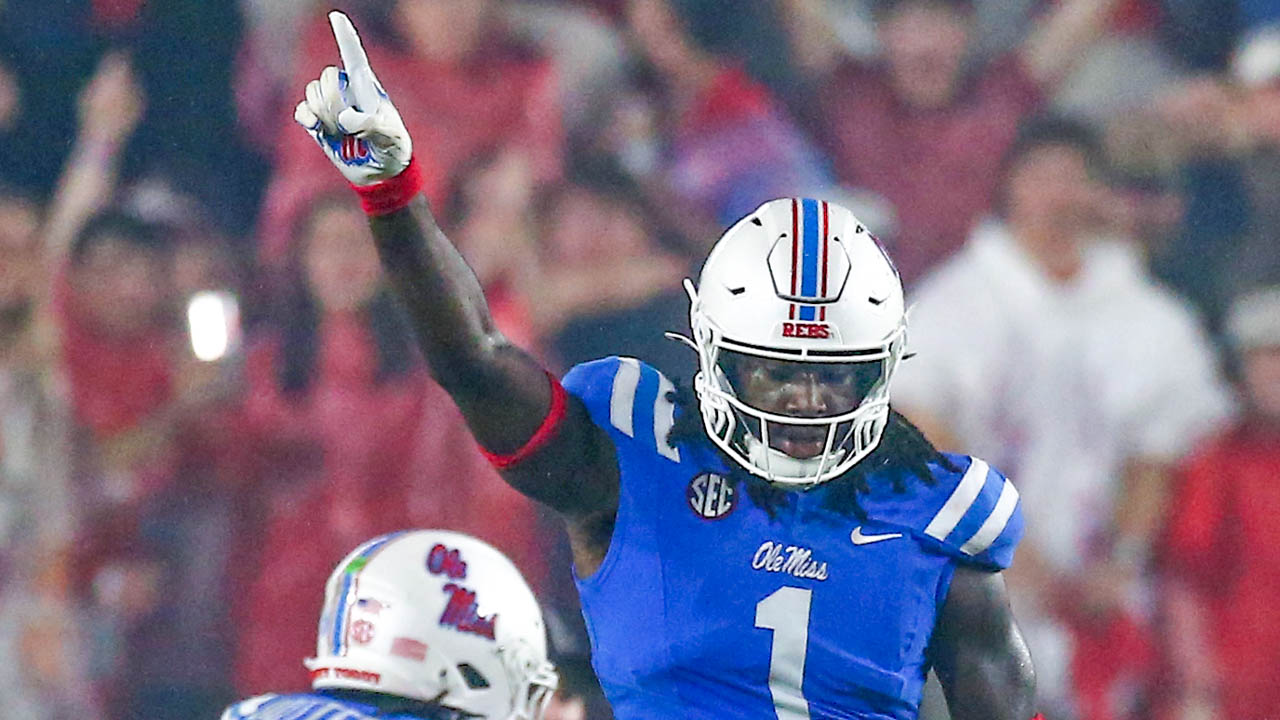 Ole Miss defensive lineman Princely Umanmielen (1) reacts during the second half against the Georgia