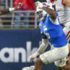 Georgia running back Nate Frazier (3) runs the ball as Ole Miss Rebels linebacker TJ Dottery (6) pursues