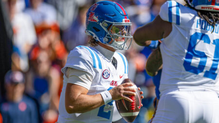 Ole Miss Rebels quarterback Jaxson Dart (2) looks to throw against the Florida Gators