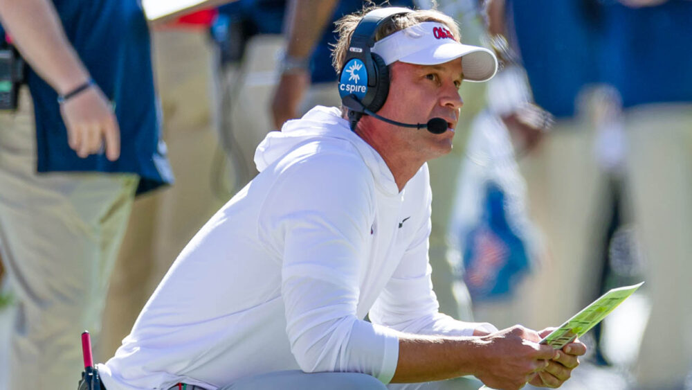 Rebels coach Lane Kiffin looks on against Florida