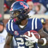 Rebels running back Ulysses Bentley IV (24) runs the ball against Mississippi State