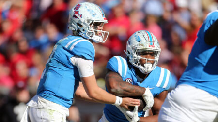 Ole Miss quarterback Jaxson Dart (2) hands the ball off to Ole Miss Rebels running back Quinshon Judkins (4) during the second half against Texas A&M