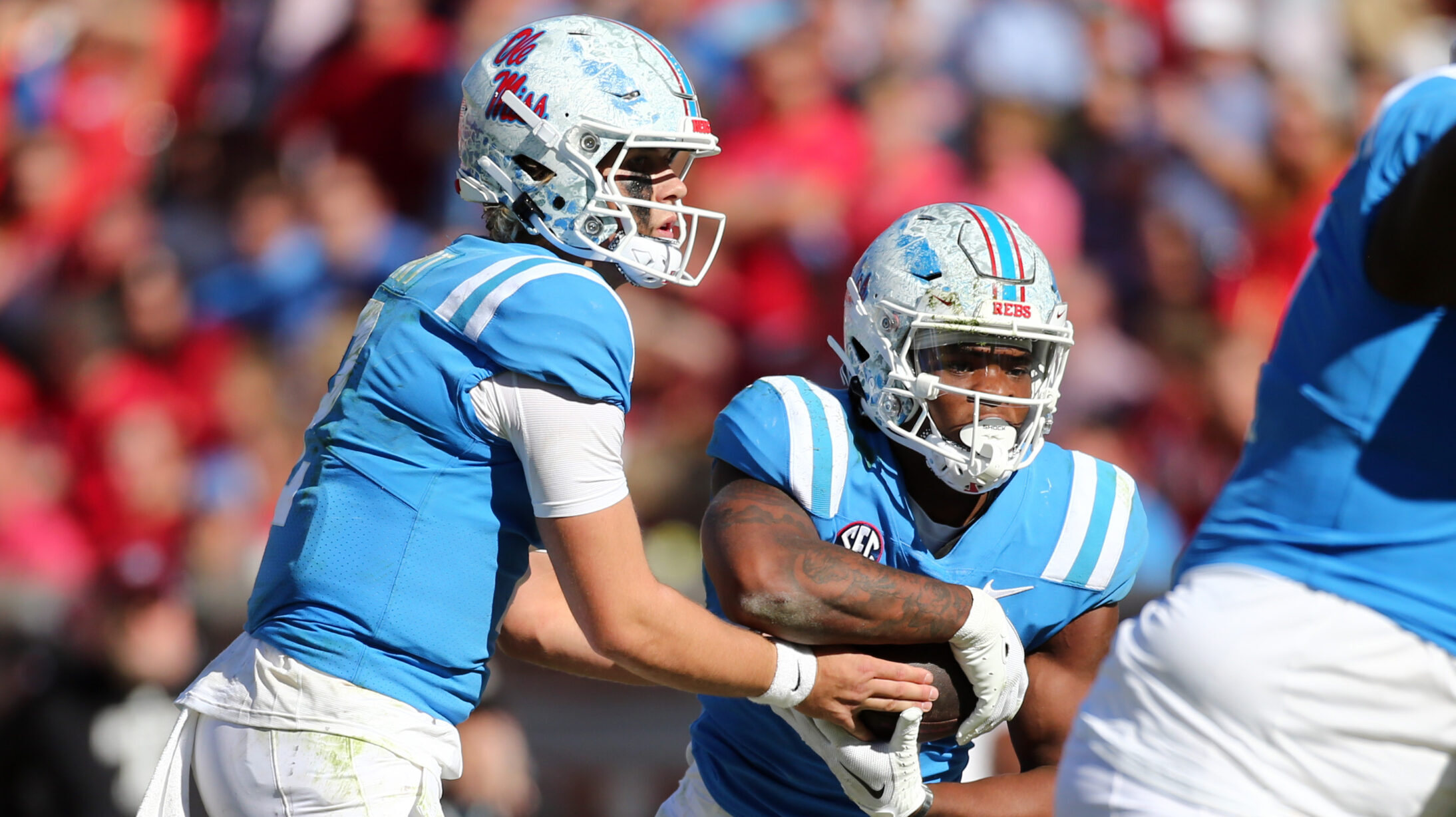 Ole Miss quarterback Jaxson Dart (2) hands the ball off to Ole Miss Rebels running back Quinshon Judkins (4) during the second half against Texas A&M