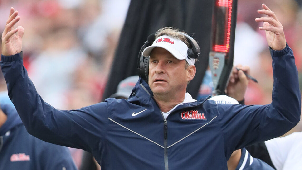 Ole Miss Rebels coach Lane Kiffin reacts to a call int he first quarter against the Arkansas Razorbacks