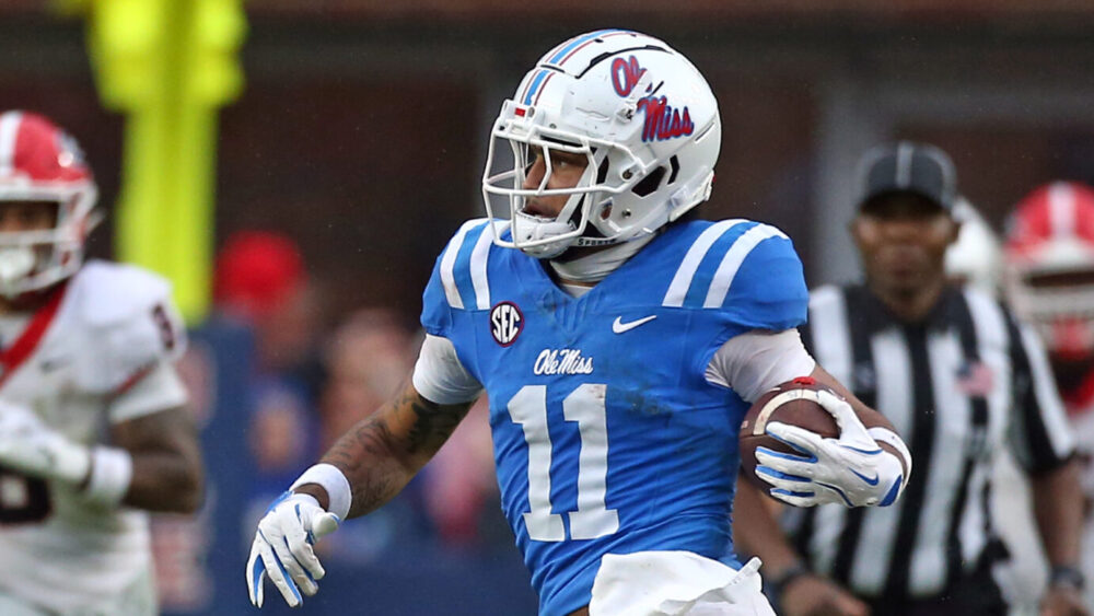 Rebels wide receiver Jordan Watkins (11) runs after a catch for a first down during the first half against Georgia