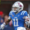 Rebels wide receiver Jordan Watkins (11) runs after a catch for a first down during the first half against Georgia