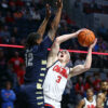 Ole Miss Rebels guard Sean Pedulla (3) shoots as Oral Roberts guard Jalen Miller (12) defends