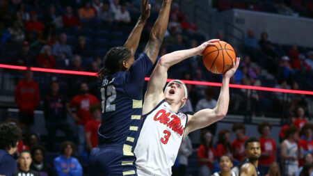 Ole Miss Rebels guard Sean Pedulla (3) shoots as Oral Roberts guard Jalen Miller (12) defends