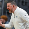 Ole Miss Rebels coach Chris Beard calls out instructions during the second half against the Louisville Cardinals