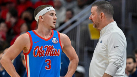 Ole Miss Rebels coach Chris Beard talks with guard Sean Pedulla (3) during the second half against the Louisville Cardinals